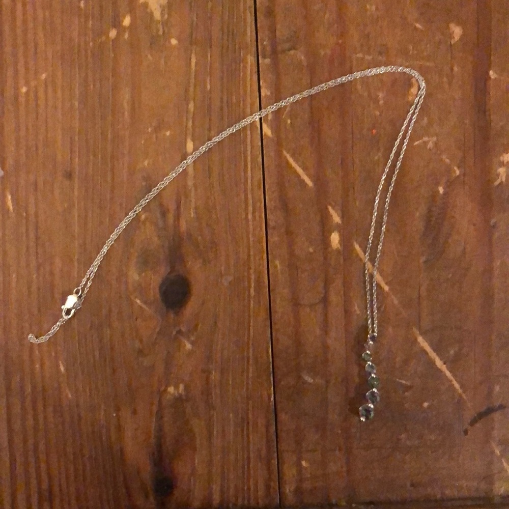 Silver necklace with gemstone charm